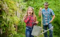 Little girl and happy man dad. earth day. family farm. spring village country. father and daughter on ranch. ecology Royalty Free Stock Photo