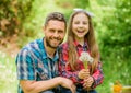 Little girl and happy man dad. earth day. family summer farm. spring village country. daughter and dad love dandelion Royalty Free Stock Photo