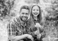 Little girl and happy man dad. earth day. family summer farm. spring village country. daughter and dad love dandelion Royalty Free Stock Photo