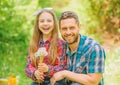 Little girl and happy man dad. earth day. family summer farm. spring village country. daughter and dad love dandelion Royalty Free Stock Photo