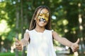 Little black girl with tiger face painting Royalty Free Stock Photo