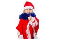 Little girl in a hat Santa Claus on white background. Royalty Free Stock Photo