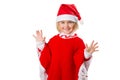 Little girl in a hat Santa Claus on white background. Royalty Free Stock Photo