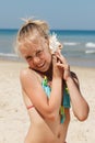 Little girl having fun on a beach Royalty Free Stock Photo