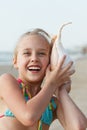 Little girl having fun on a beach Royalty Free Stock Photo