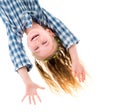 Little fgirl hanging upside down Royalty Free Stock Photo
