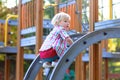 Little girl having fun at playground