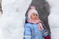 Little girl having fun in snow cave Royalty Free Stock Photo