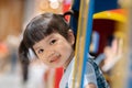 Little girl with head in the car sticking her head out of window. having fun travel and looking out. Royalty Free Stock Photo