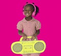 Little Girl Headphones Holding Radio.