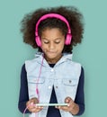 Little Girl Headphones Using Phone