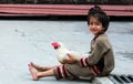 Little Girl with Hen