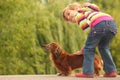 Little girl and her dachshund Royalty Free Stock Photo