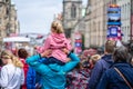 Little girl On Her Dads Shoulders.Edinburgh Festival Fringe