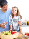 Little girl and her father having breakfast Royalty Free Stock Photo