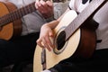 little girl and her father are playing guitar. Learning to play the guitar. Music education and extra-curricular lessons