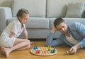 Family playing ludo.