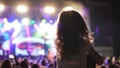 Little girl on her father`s shoulder watching and cheering in the audience during concert Royalty Free Stock Photo