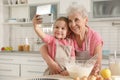 Little girl and her grandmother taking selfie Royalty Free Stock Photo