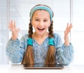 Little girl and her magic tablet Royalty Free Stock Photo