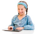 Little girl and her magic tablet Royalty Free Stock Photo