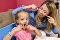 Little girl and her mom making funny faces Royalty Free Stock Photo