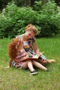 Little girl and her mother read book Royalty Free Stock Photo