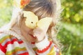 Little Girl Hiding Behind the Leaf on Sunny Day Royalty Free Stock Photo