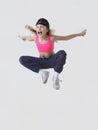 little girl hip hop dancer jumping in studio Royalty Free Stock Photo