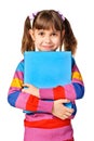 Little girl holding abig book