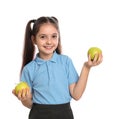 Little girl holding apples on white. Healthy food for school lunch Royalty Free Stock Photo