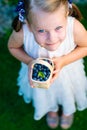 Little girl holding a basket of blueberries - shallow depth of f Royalty Free Stock Photo