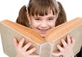 Little girl holding big book. isolated on white background Royalty Free Stock Photo