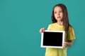 Little girl holding a blank tablet computer Royalty Free Stock Photo