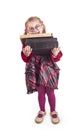 Little girl holding books