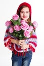 Little girl holding a bouquet of pink roses Royalty Free Stock Photo