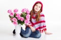 Little girl holding a bouquet of pink roses Royalty Free Stock Photo