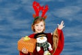 Little girl holding Christmas gift Royalty Free Stock Photo