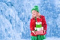 Little girl holding Christmas presents Royalty Free Stock Photo