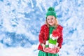 Little girl holding Christmas presents Royalty Free Stock Photo