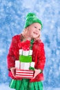 Little girl holding Christmas presents Royalty Free Stock Photo