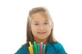 Little girl holding crayons