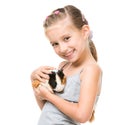 Little girl holding a guinea pig Royalty Free Stock Photo