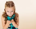 Little girl holding in hands a small turtle. Royalty Free Stock Photo