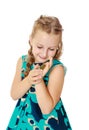 Little girl holding in hands a small turtle. Royalty Free Stock Photo