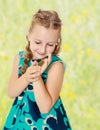 Little girl holding in hands a small turtle. Royalty Free Stock Photo