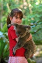 Little girl holding a Koala Royalty Free Stock Photo