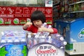 Little girl holding mineral water