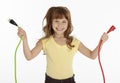 Little Girl Holding Power Cords Royalty Free Stock Photo