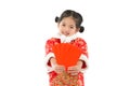 Little girl holding red envelopes for lucky